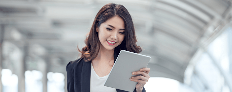 Woman reading tablet